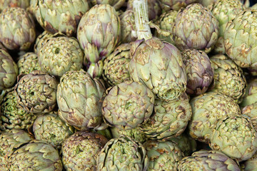 Artichokes. Vegetables market in Italy. Agricultural food. Fresh organic products.