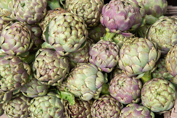 Fototapeta premium Artichokes. Vegetables market in Italy. Agricultural food. Fresh organic products.