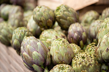 Obraz premium Artichokes. Vegetables market in Italy. Agricultural food. Fresh organic products.