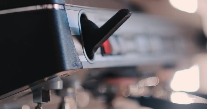 Pushing button of coffee-machine close-up