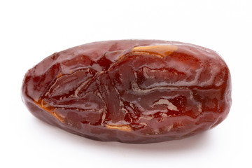 Dry dates isolated on white background. Top view. Flat lay pattern.