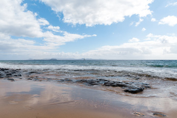 Panorama of beautiful beach and tropical sea of Lanzarote. Canaries