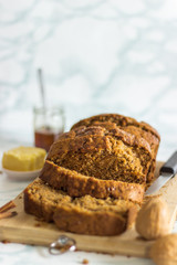 Banana Bread Loaf And Slices With Honey And Butter