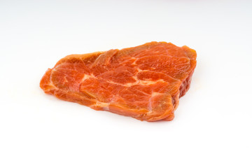 Fresh raw beef meat slices isolated over white background. Selective focus