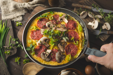 Homemade delish egg omelette with salami