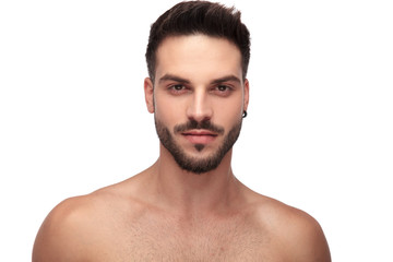 Fototapeta premium charming undressed man with beard looking to camera