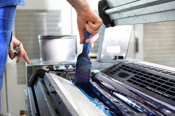 Printing. Printing machine. The printer applies ink inks. The printing process.