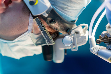 Surgical team operating a patient in an operation theater. Surgeon at work in the hospital....