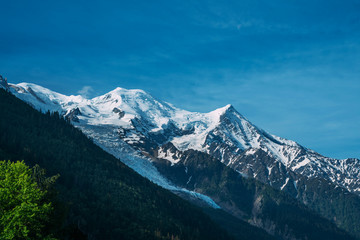 Fototapeta na wymiar Chamonix, south-east France, Auvergne-Rhône-Alpes. Aiguille du Midi, French Alps. Ski resort. Chamonix Mont Blanc, France. Holidays in Europe
