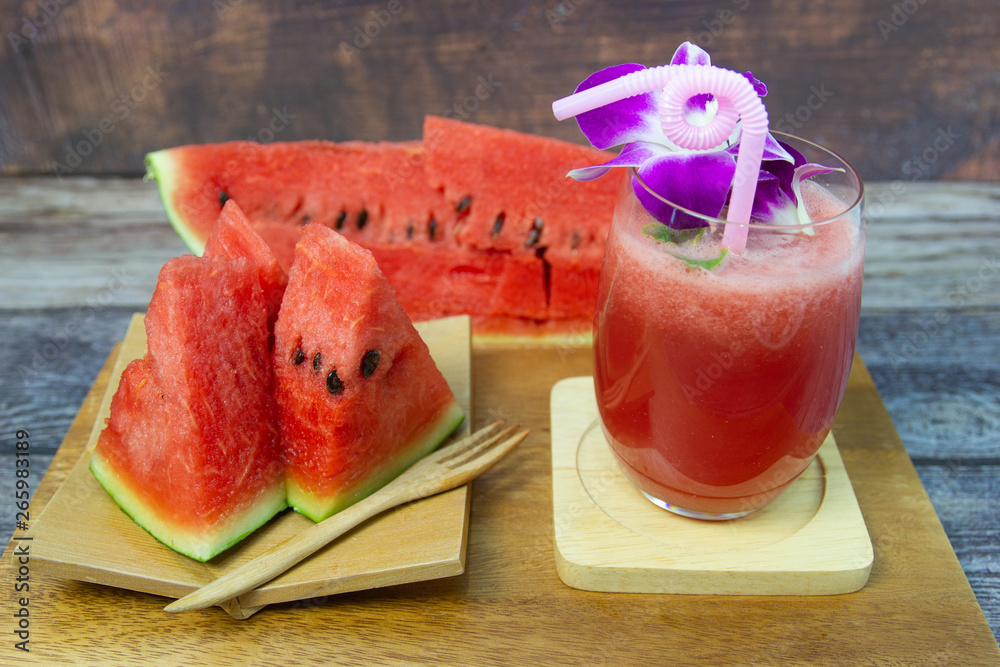 Wall mural Fresh watermelon and watermelon juice fruit drink for hot summer days