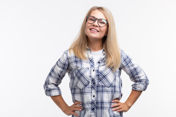 Teeth health, dentistry and bite correction - Happy smiling woman in glasses with braces on white...