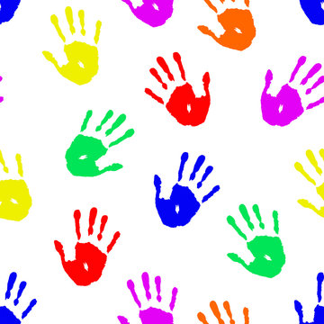 Child's handprints on white background. Seamless pattern with colorful imprints of kids hands for wallpaper
