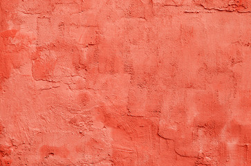 coral textured plaster on the wall, trend of 2019 concept