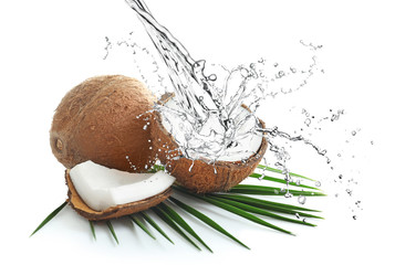 Ripe coconuts on white background