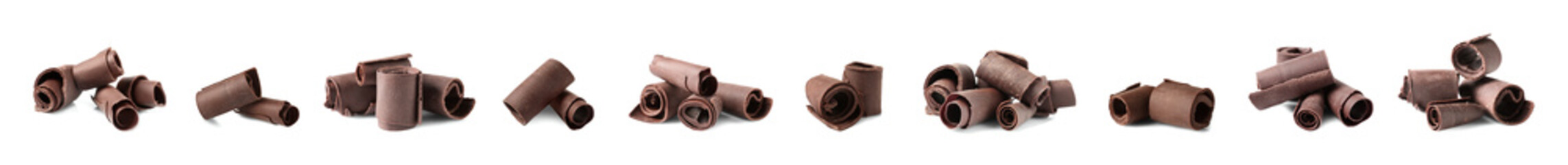 Set of delicious chocolate curls on white background