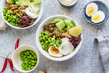 Vegetarian lunch bowl with marinated egg and edamame beans