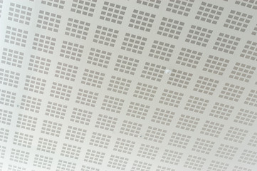 Obraz premium Pattern of holes in a ceiling.