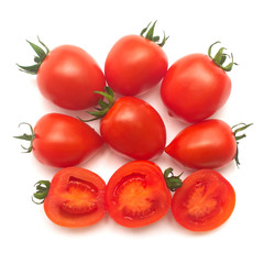 Tomatoes collection of whole and sliced isolated on white background. Tasty and healthy food. Flat lay, top view