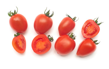 Tomatoes collection of whole and sliced isolated on white background. Tasty and healthy food. Flat lay, top view