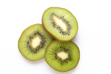 Fototapeta premium Kiwi fruit slices on white background.