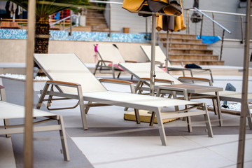 Plenty of sun loungers on the sea beach 