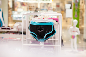 Close up Men's swimming trunks in the store.