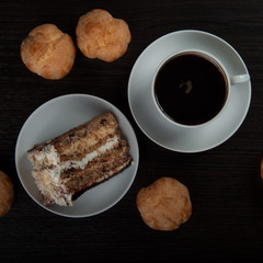 cup of coffee and cake on plate