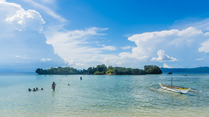 Big blue sea with beach and sky