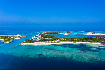 Fototapeta na wymiar Aerial view, lagoon of Maldives island Olhuveli and Bodufinolhu or Fun Island Resort, South Male Atoll, Maldives