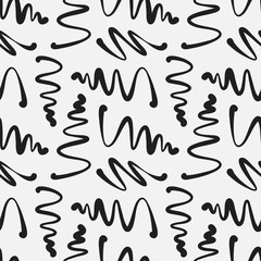 Scribbles and squiggles seamless vector pattern. Hand drawn brush stroke zig zag paint lines in black and white. Decorative texture for print, packaging, wrapping, web. Isolated repetitive tiles.
