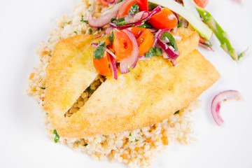 Fried dory fish fillet with Oriental tomato salad