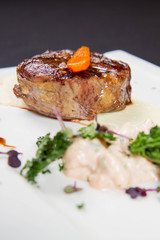 Beef sirloin with sweet potato mousse, curry sauerkraut and fresh thyme sauce