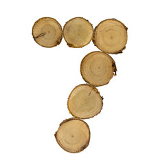 font of number 7 wooden stumps, white background isolated