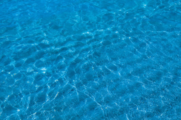 blue surface water in swimming pool