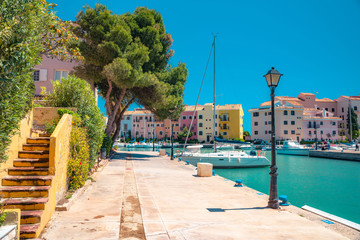 Bright sunny day at Port Saplaya, Valencia's Little Venice. Spain . Yachts docked near  beautiful...
