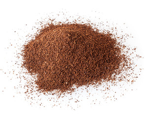 Heap of ground roasted coffee beans isolated on white background