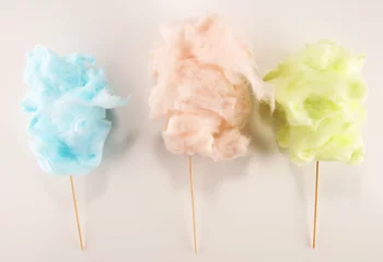 Fototapete colorful cotton candy floss. sweet party food in pink and green © beats_