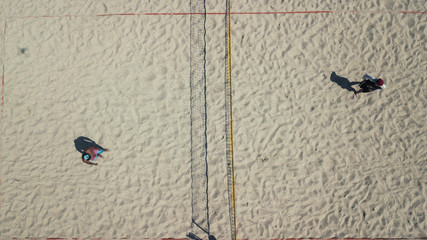 Beach volleyball top view. Sports and beach sports. Photographed from the drone. Aero photo filming