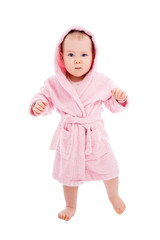 full length portrait of funny baby girl in pink bathrobe posing after bath isolated on white