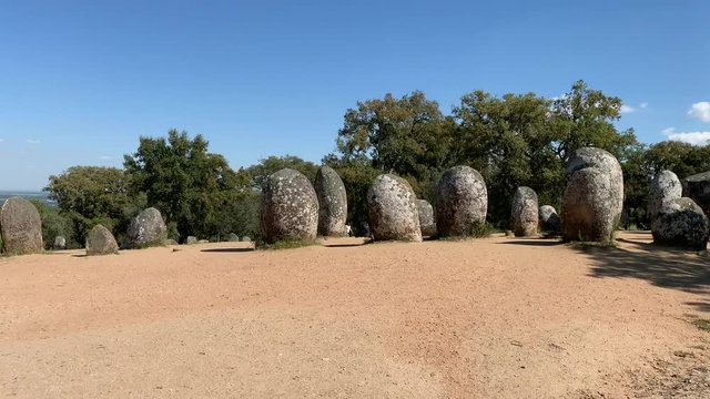 Megalithic stone formation in Portugal on a blue sky day with copy space