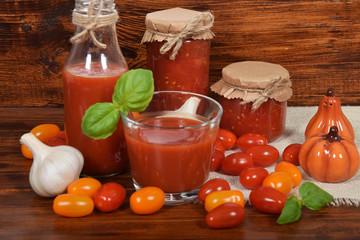 fresh tomato juice with basil in a glass