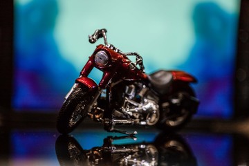 Fototapeta na wymiar toy red motorcycle 