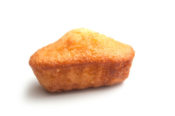 closeup of madeleine cake on white background