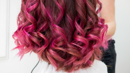 Naklejka premium Healthy curly pink-purple hair 