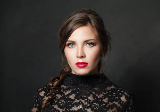 Pretty Woman With Red Lips Makeup Hair On Black Background