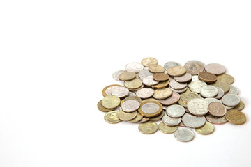 pile of coins isolated on white background