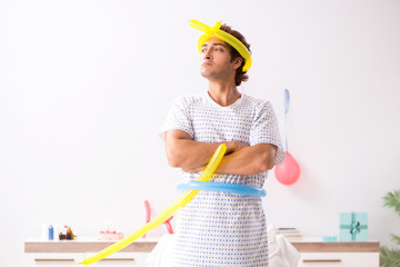 Young man celebrating his birthday in hospital