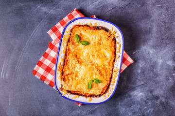 Traditional italian lasagna with vegetables, minced meat and cheese.