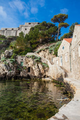 Dubrovnik West Pier and the medieval Fort Lovrijenac located on the western wall of the city