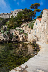 Fototapeta premium Dubrovnik West Pier and the medieval Fort Lovrijenac located on the western wall of the city
